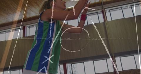 Dynamic Female Basketball Player with Strategy Overlay