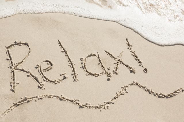 Relax Written in Sand on Beach - Download Free Stock Photos Pikwizard.com