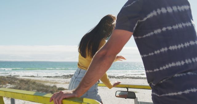 Young Couple Exploring Beach Together in Summer - Download Free Stock Images Pikwizard.com