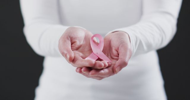 Hands Holding Pink Ribbon Symbol of Breast Cancer Awareness - Download Free Stock Images Pikwizard.com