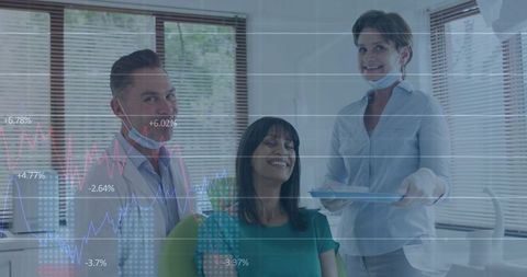 Dental team presenting treatment plan to smiling patient with data overlay showing metrics