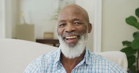 Smiling Senior African American Man in Cozy Living Room - Download Free Stock Images Pikwizard.com