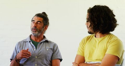 Mentorship Meeting Between Two Men with Focused Engagement