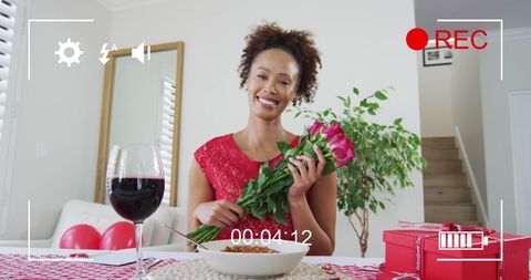 Woman Holding Roses on Video Call Celebrating Valentine's Day