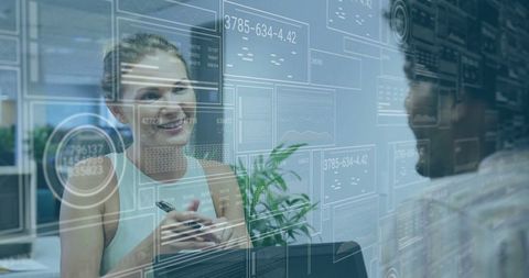 Woman Engaging in Futuristic Data Interaction in Modern Office