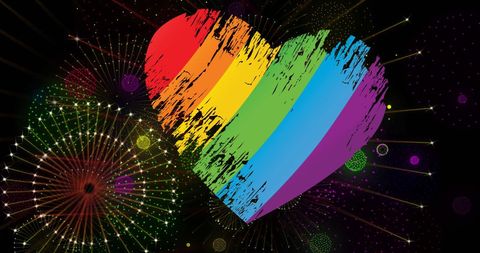 Rainbow heart with fireworks celebrating lgbtq pride