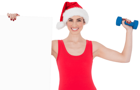 Festive fitness enthusiast holding dumbbell and blank sign