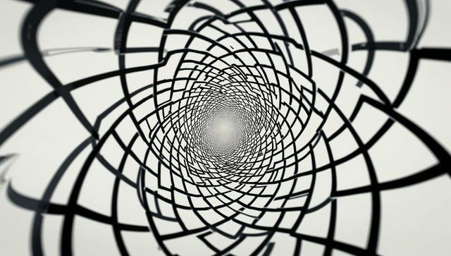 Intriguing black spiral grid tunnel with bright central focus