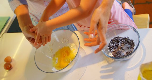 Child and Parent Baking Together in Kitchen - Download Free Stock Images Pikwizard.com