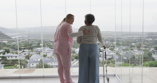Caregiver Assisting Senior Woman With Walker Gazing at Scenic View - Download Free Stock Images Pikwizard.com