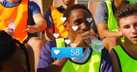 Athletes Resting on Bleachers with Social Media Engagement