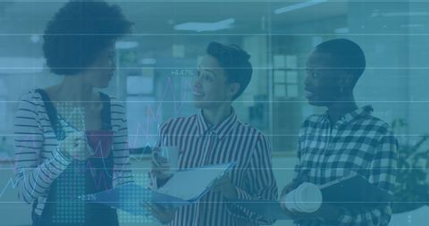 Diverse Business Professionals Analyzing Financial Statistics