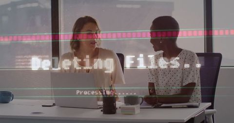 Diverse Colleagues in Office with Digital Processing Interface