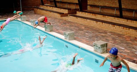 Children Joyfully Diving into Swimming Pool on Summer Day - Download Free Stock Images Pikwizard.com