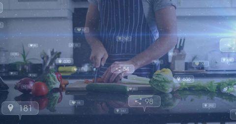 Home cook chopping vegetables on modern kitchen counter with social media overlay icons