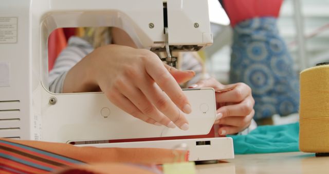 Close-up of person using sewing machine for crafting - Download Free Stock Images Pikwizard.com