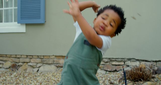 Energetic Child Playing Outdoors in Summer - Download Free Stock Images Pikwizard.com