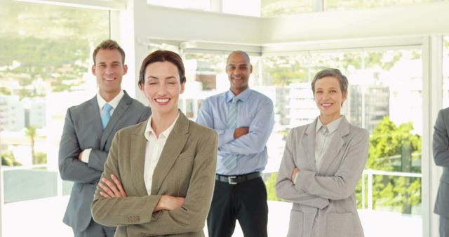 Smiling Business Team Standing with Confidence in Modern Office - Download Free Stock Images Pikwizard.com