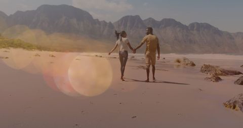Couple Enjoying Romantic Walk on Scenic Beach Landscape - Download Free Stock Images Pikwizard.com
