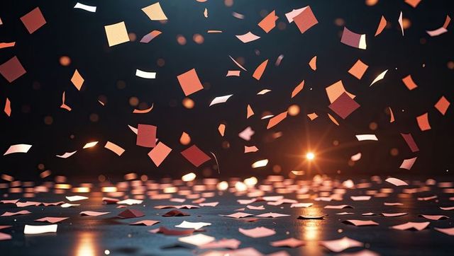 Colorful Paper Confetti Fluttering with Warm Bokeh Lights