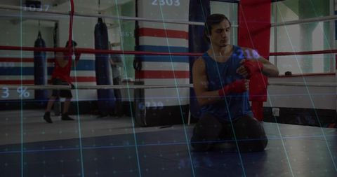 Boxer Wrapping Hands Preparing for Intense Training Session