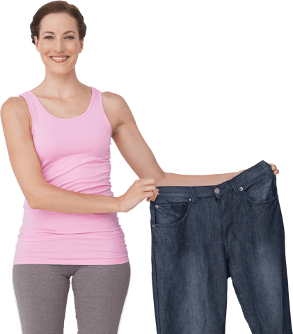 fit woman holding old jeans showing weight loss success transparent - Download Free Stock Videos Pikwizard.com