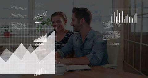 Business Professionals Analyzing Digital Charts at Office Desk