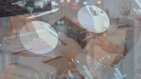 Businessman Using Tablet with Digital Financial Analytics Overlay