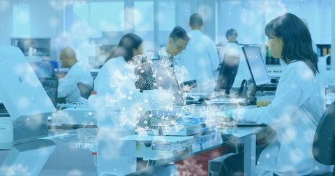 Biomedical Researchers Analyzing Data with Digital Virus Illustration Overlay - Download Free Stock Images Pikwizard.com