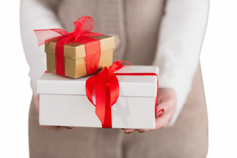 Woman Holding Gift Boxes with Red Ribbons on Transparent Background - Download Free Stock Videos Pikwizard.com