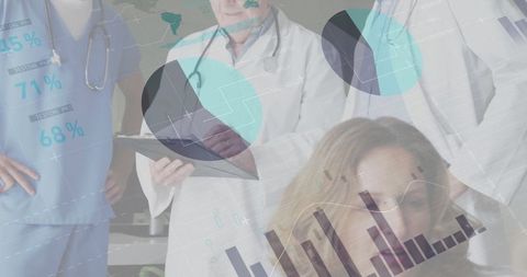 Medical Team Using Digital Analytics in Modern Clinic for Patient Care