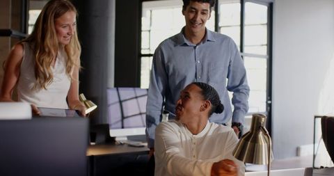 Happy Professionals Collaborating in Modern Office