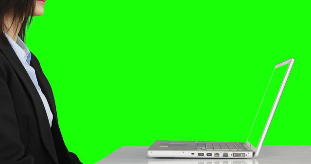 Professional Woman Working on Laptop with Green Screen Background - Download Free Stock Images Pikwizard.com
