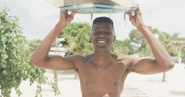 Man with Surfboard Smiling on Tropical Beach - Download Free Stock Images Pikwizard.com