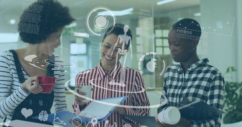 Diverse business colleagues collaborating with technology