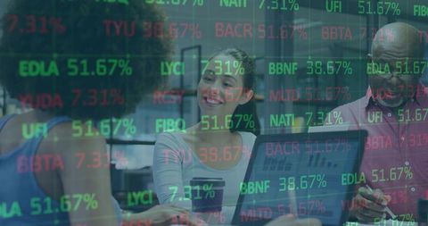 Colleagues Analyzing Stock Data During Business Meeting