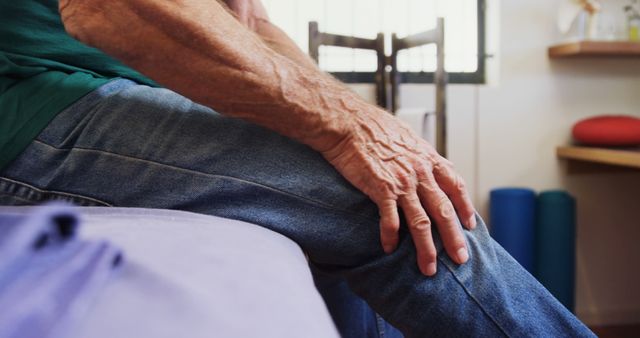 Senior Man Massaging Knee Pain at Home - Download Free Stock Images Pikwizard.com