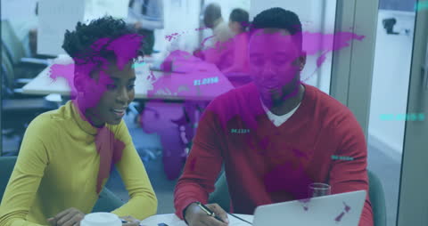 Diverse Business Colleagues Analyzing Data in Modern Office