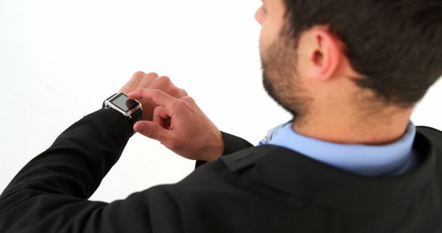 Businessman Using Smartwatch for Checking Notifications - Download Free Stock Images Pikwizard.com