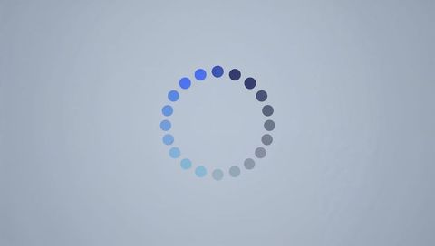 Spinning blue-gray loading ring with 24 dots on textured canvas for ui and branding