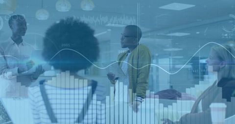 Business Team Discussing Innovation with Data Visualization Overlay