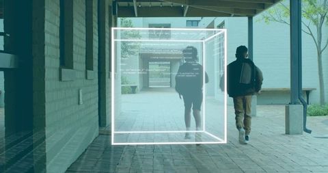 Two Boys Walking in Urban Passageway Captured with Digital Elements