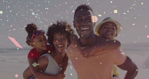 Joyful Family Fun at Beach Celebrating Summer Holiday