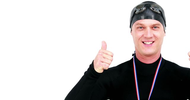 Happy Swimmer Wearing Goggles and Swimming Cap Giving Thumbs Up - Download Free Stock Images Pikwizard.com