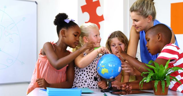 Diverse Group of Children Learning Geography with Teacher - Download Free Stock Images Pikwizard.com