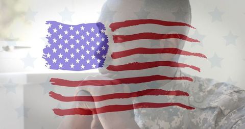 Contemplative Soldier Near Window with US Flag Reflection