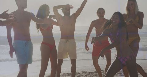 Joyful Group of Friends Celebrating on Sunny Beach