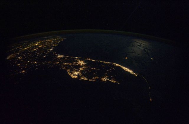 INTERNATIONAL SPACE STATION -- ISS025-E-10716 -- This image of the southeast United States from the International Space Station on Halloween night is anything but frightening. From 220 miles above Earth, an Expedition 25 crew member aboard the orbiting laboratory took the image, which shows the Gulf and Atlantic coasts, the Florida panhandle and part of the Georgia coast.   The Expedition 25 crew members are NASA astronaut and Commander Doug Wheelock, NASA astronauts Scott Kelly and Shannon Walker, and Russian cosmonauts Oleg Skripochka, Fyodor Yurchikhin and Alexander Kaleri, all flight engineers. Two days later, NASA and its international partners will celebrate 10 years of continuous human presence aboard the station. Image credit: NASA