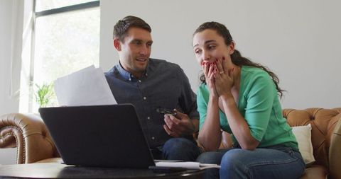 Young Couple Managing Finances With Laptop at Home - Download Free Stock Images Pikwizard.com