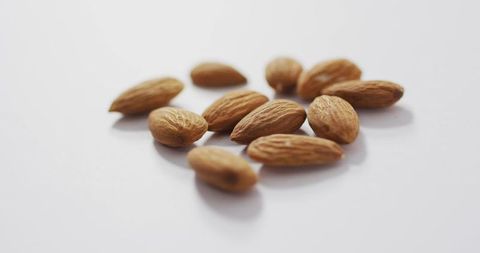 Fresh Almonds on White Backdrop for Healthy Vegan Lifestyle - Download Free Stock Images Pikwizard.com